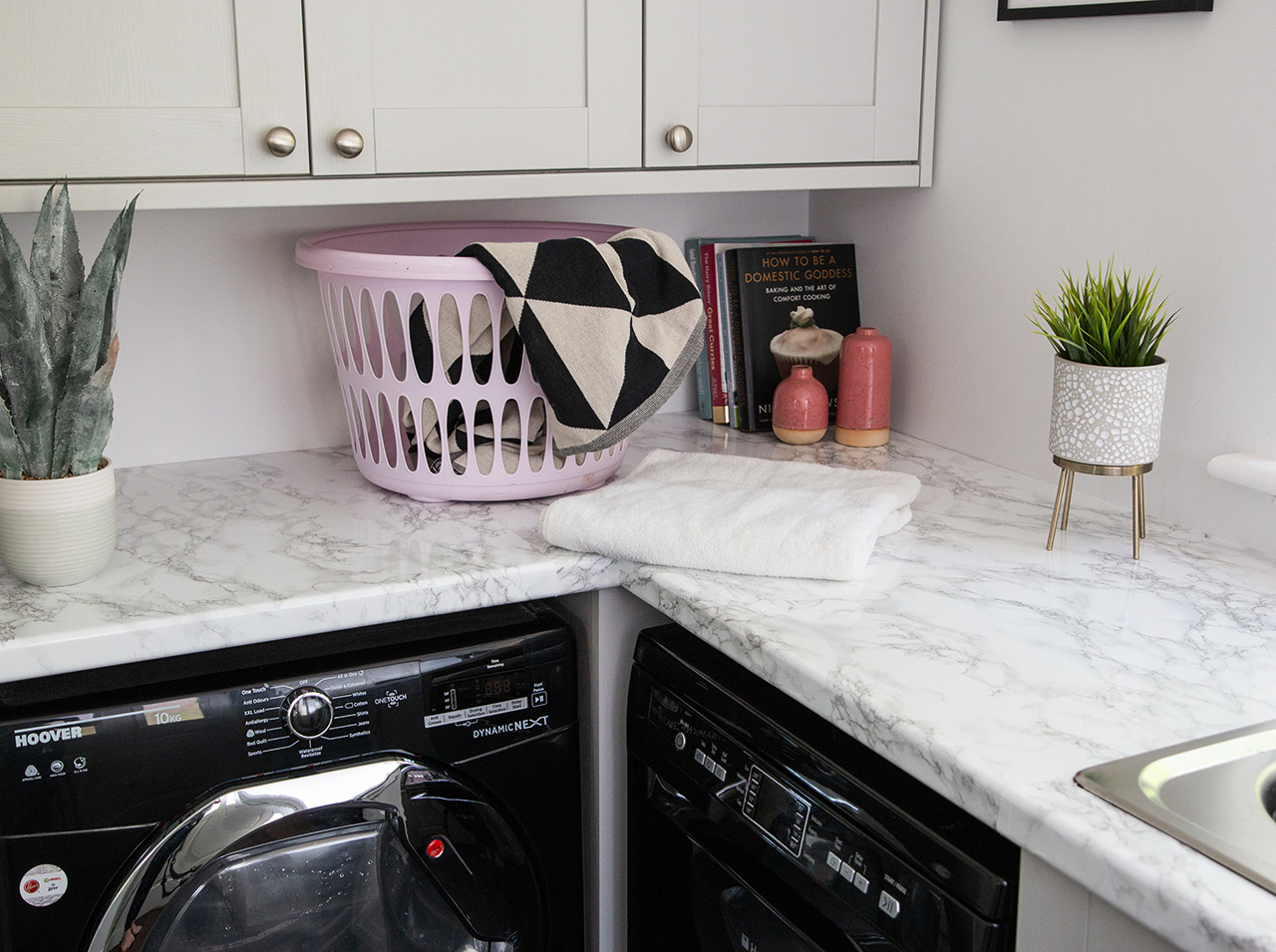 Utility room worktop in a marble look with d-c-fix® Marmi grey adhesive foil.